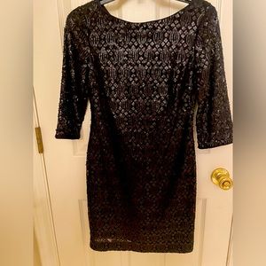Calvin Klein black sequin holiday party dress.